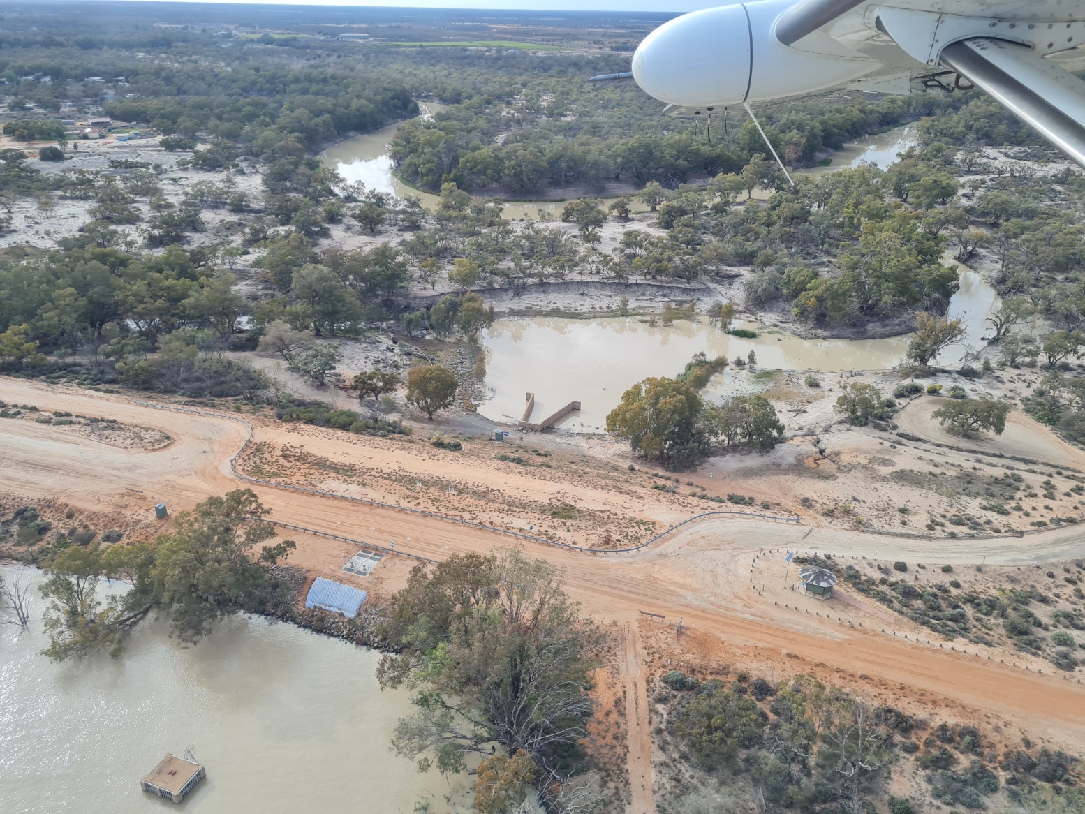 Water is let out of Lake Menindee into the Darling River through a regulator.