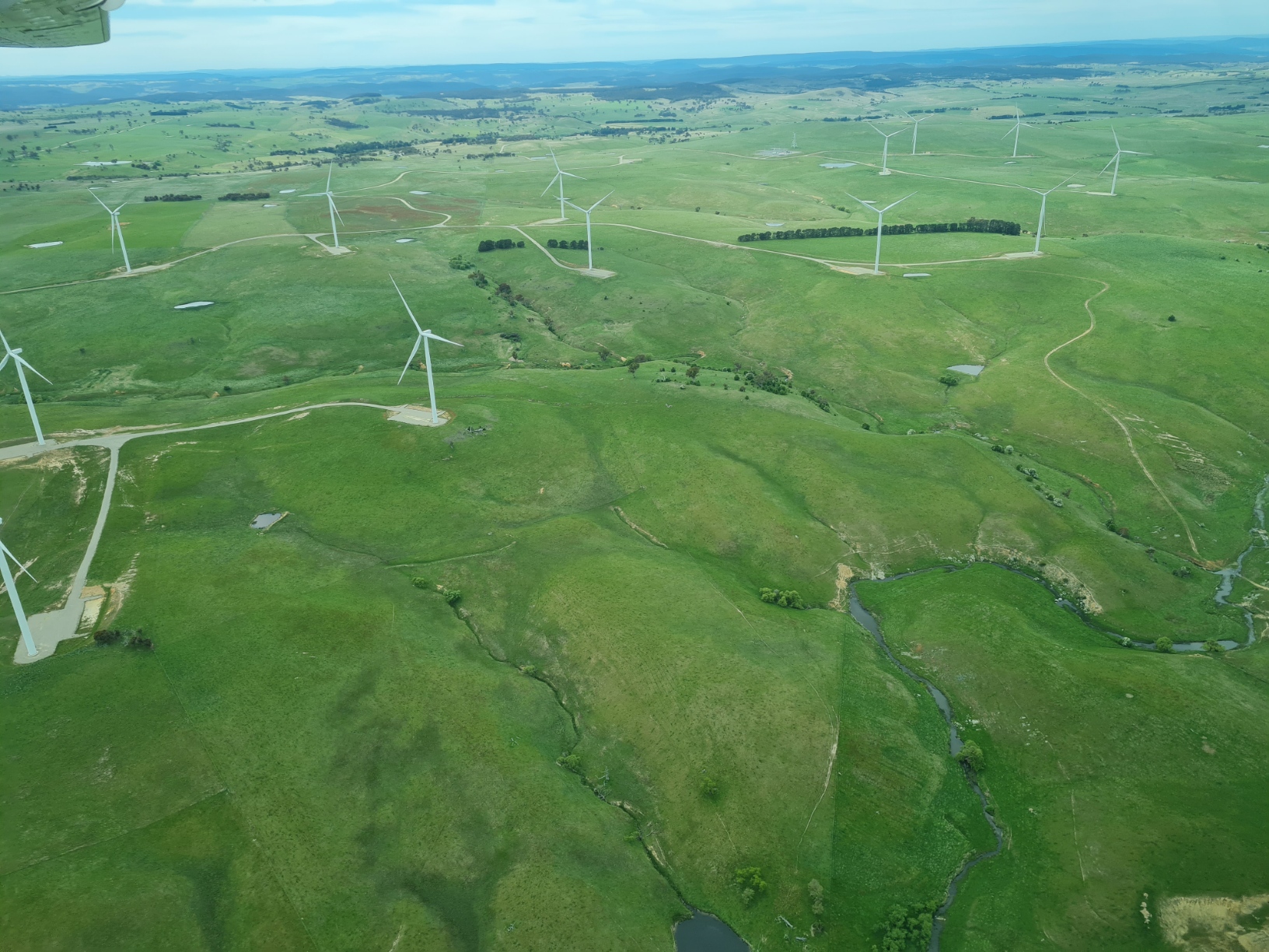Wind turbines are prominent around Crookwell, near Pejar Dam.